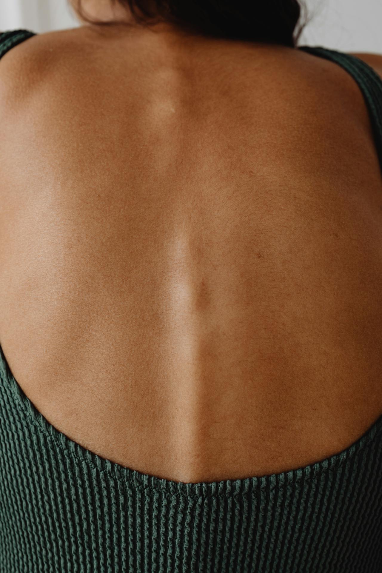 View of client before getting treatment for myofascial release therapy from a licensed massage therapist.