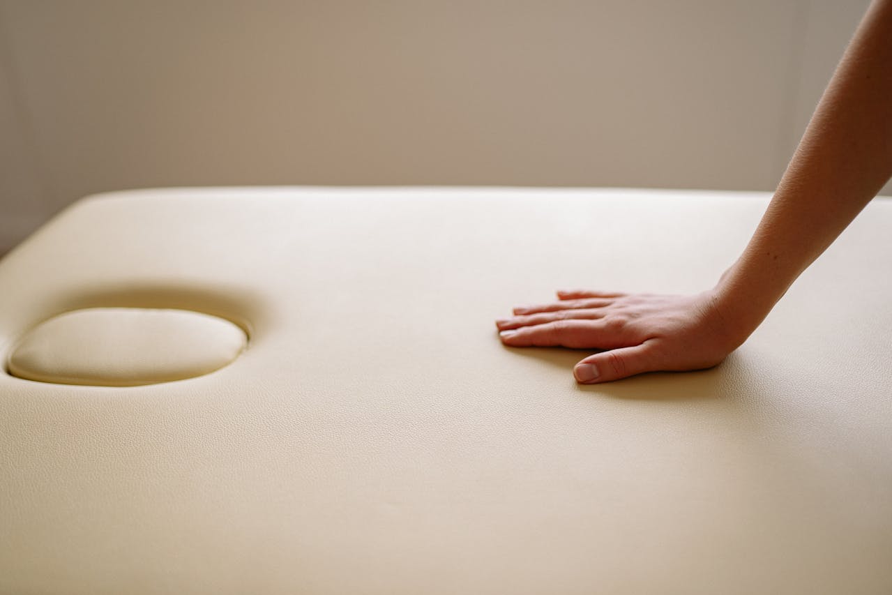 A serene and inviting massage room set up for a Swedish massage session.